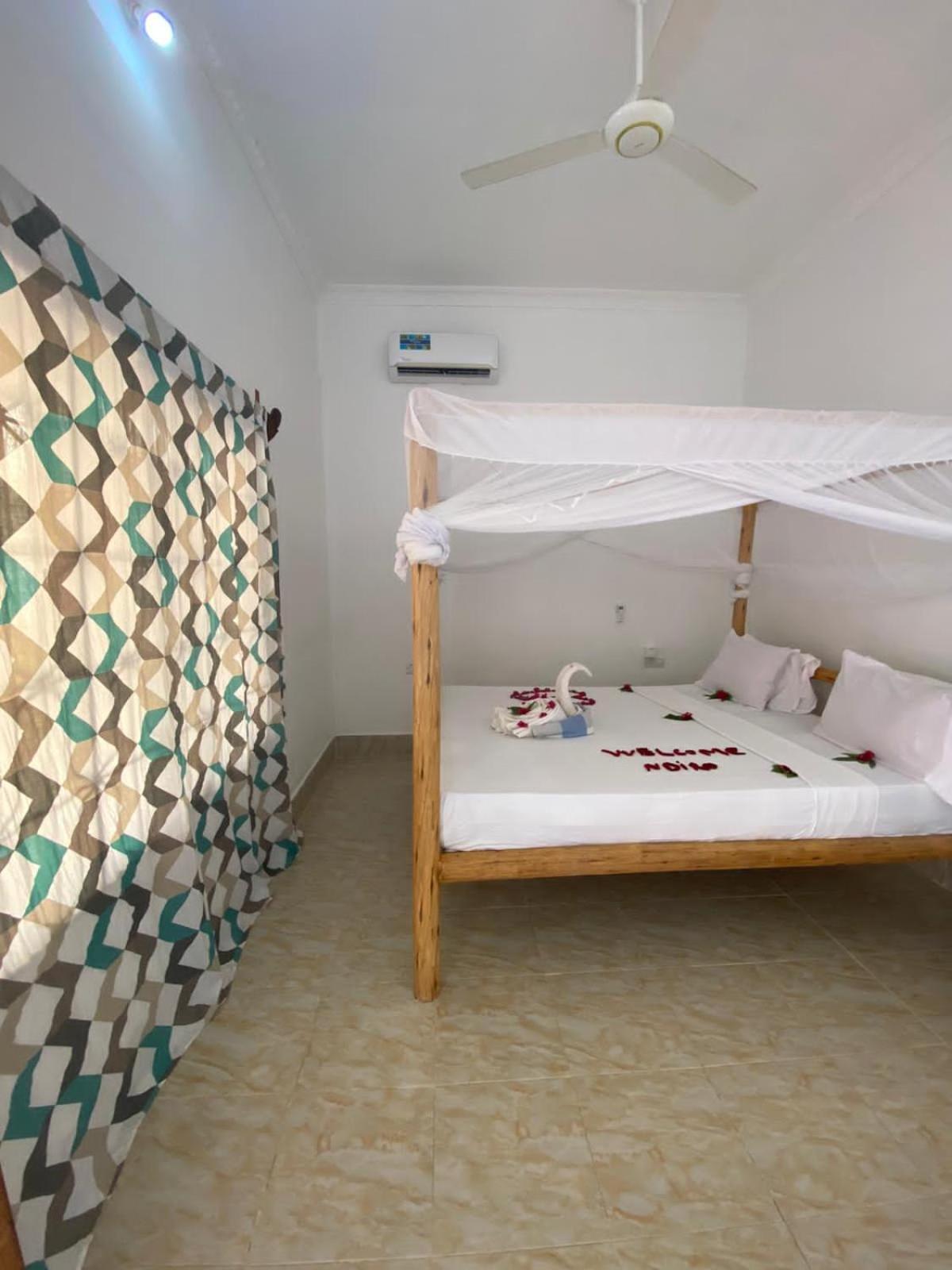 Ndiro Beach House Kendwa Chambre photo
