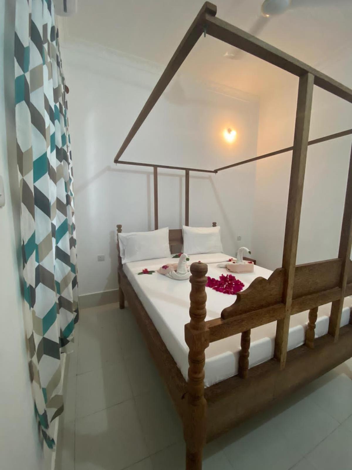 Ndiro Beach House Kendwa Chambre photo